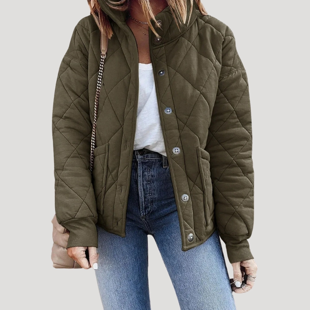 Quilted bomber jacket in light gray with padded detailing. 2