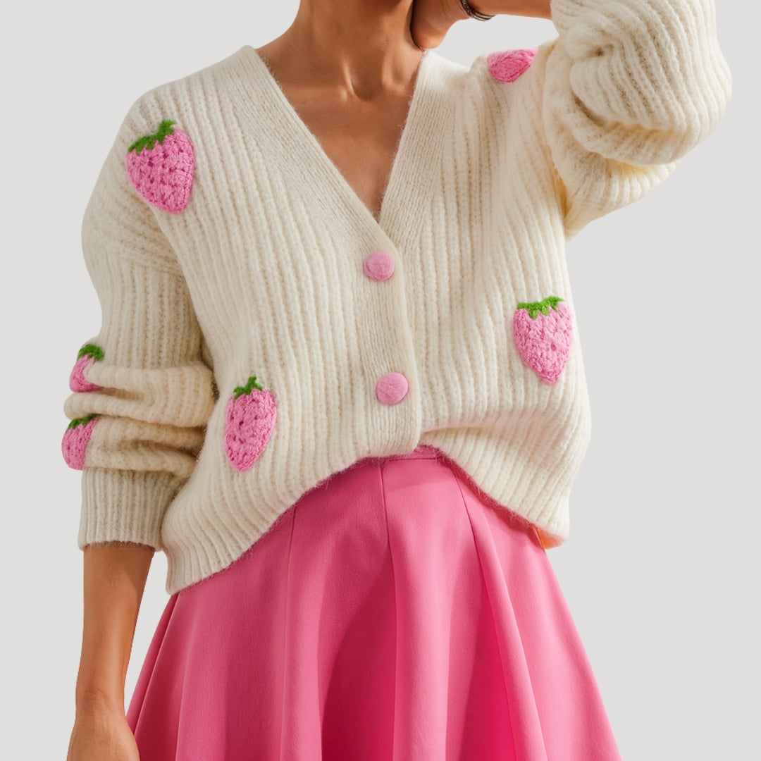 Chunky cardigan in cream with strawberry detailing. 1
