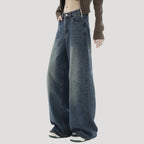 Dam högmidjade vida mörka denimjeans med breda ben och lös passform
