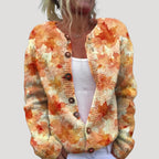 Dam stickad kofta med knappar och mönster