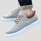 Dam sneakers i tyg med snörning låg modell