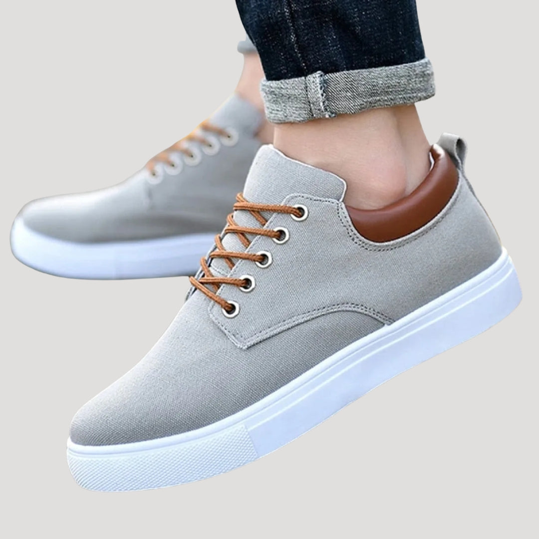 Dam sneakers i tyg med snörning låg modell