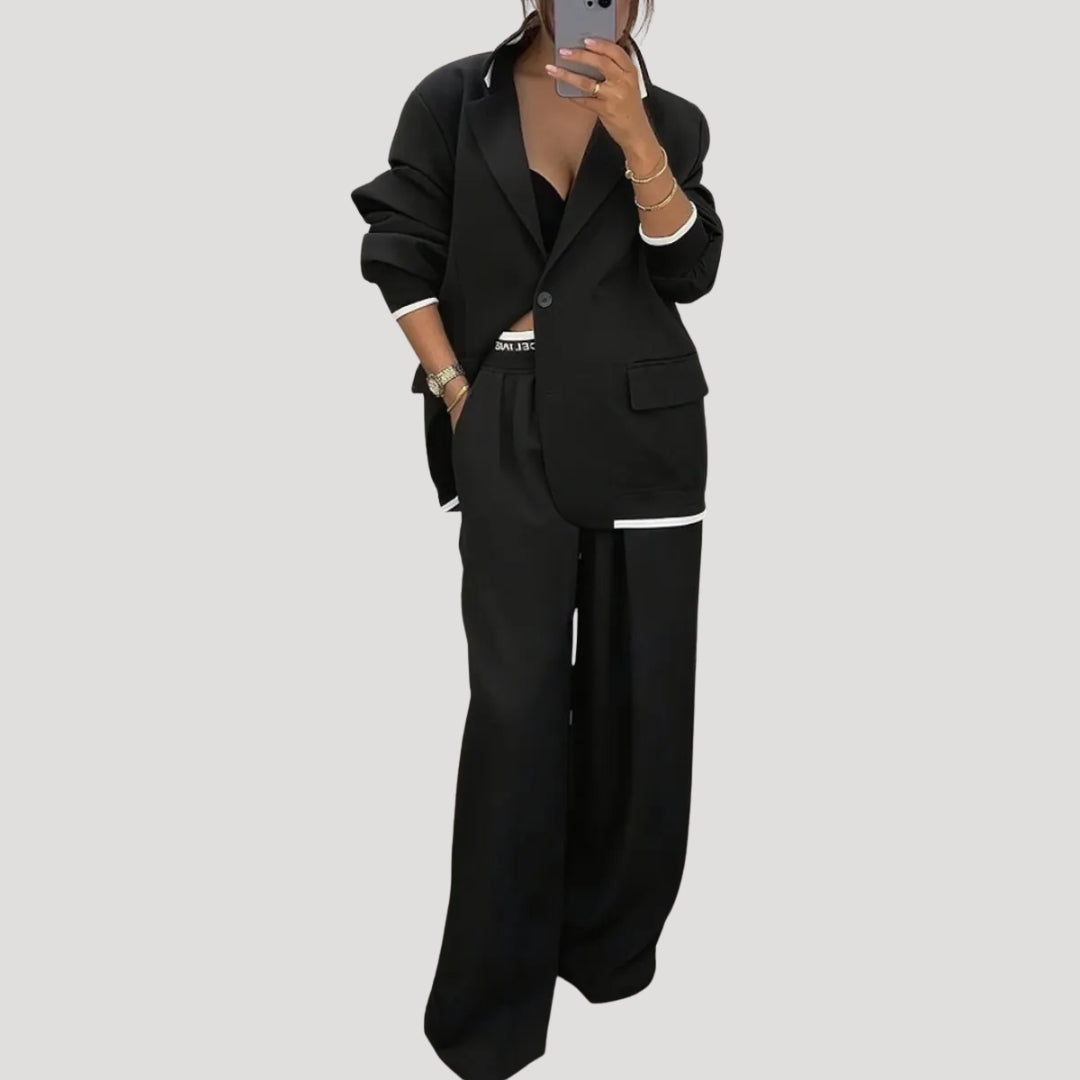 Dam kostym set med oversized kavaj och vida byxor