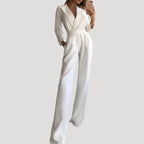 Dam jumpsuit med vida ben och lång ärm