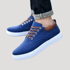 Dam sneakers i tyg med snörning låg modell