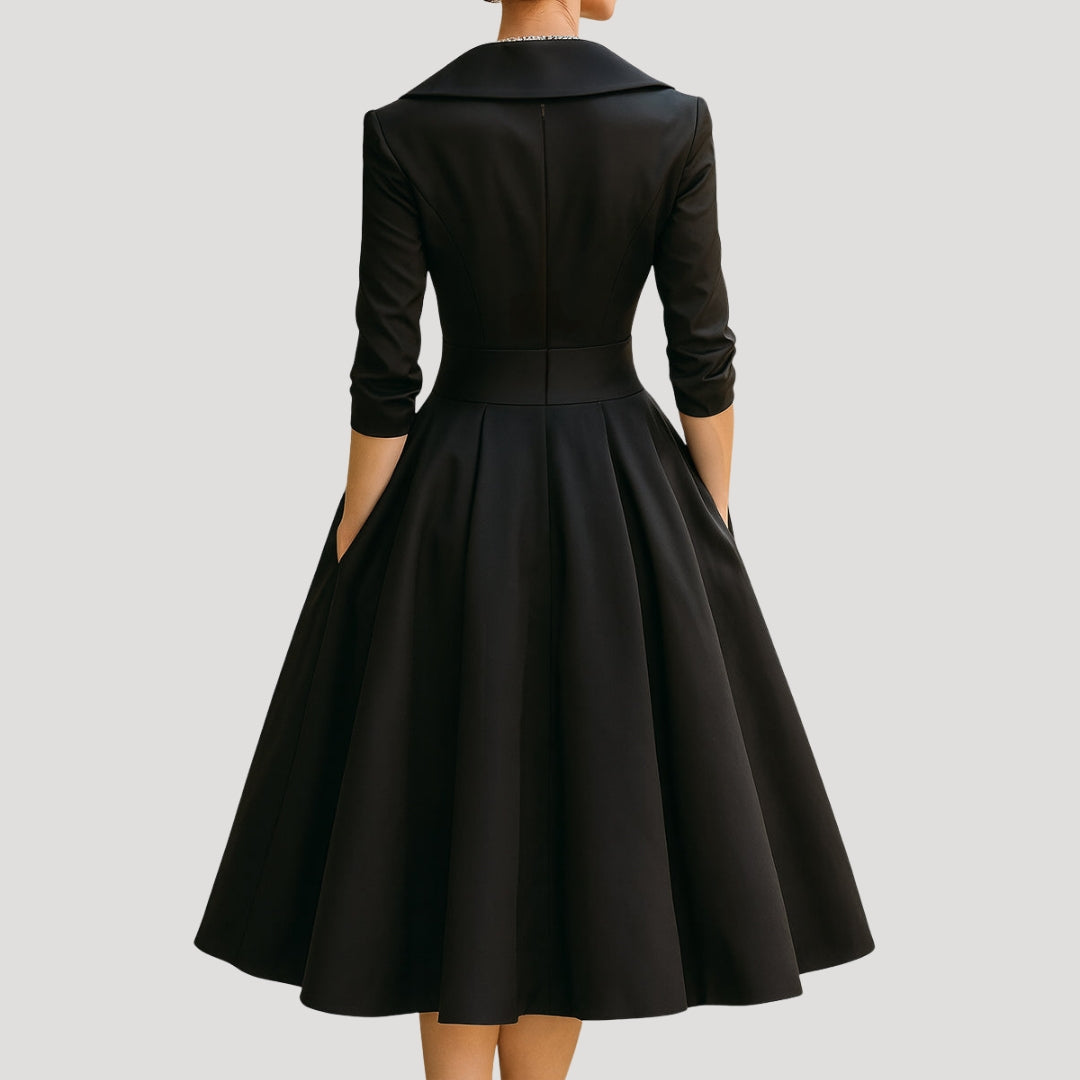 Dam elegant omlottklänning i midilängd med ärm