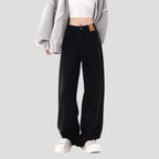 Dam högmidjade svarta vida denimjeans med breda ben och lös passform