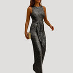 Dam jumpsuit glittrig fest knytband elegant stil modern passform