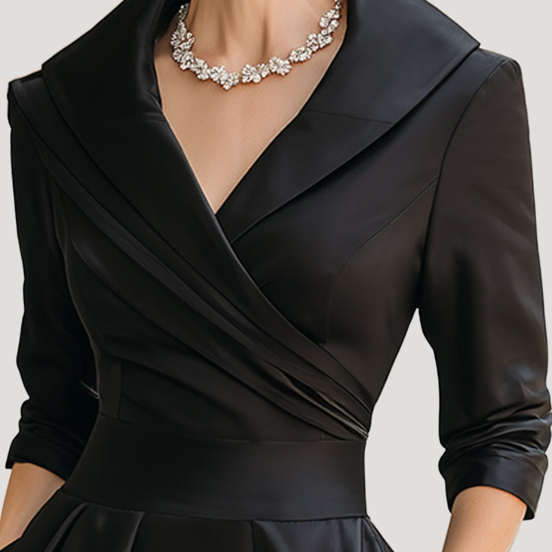 Dam elegant omlottklänning i midilängd med ärm