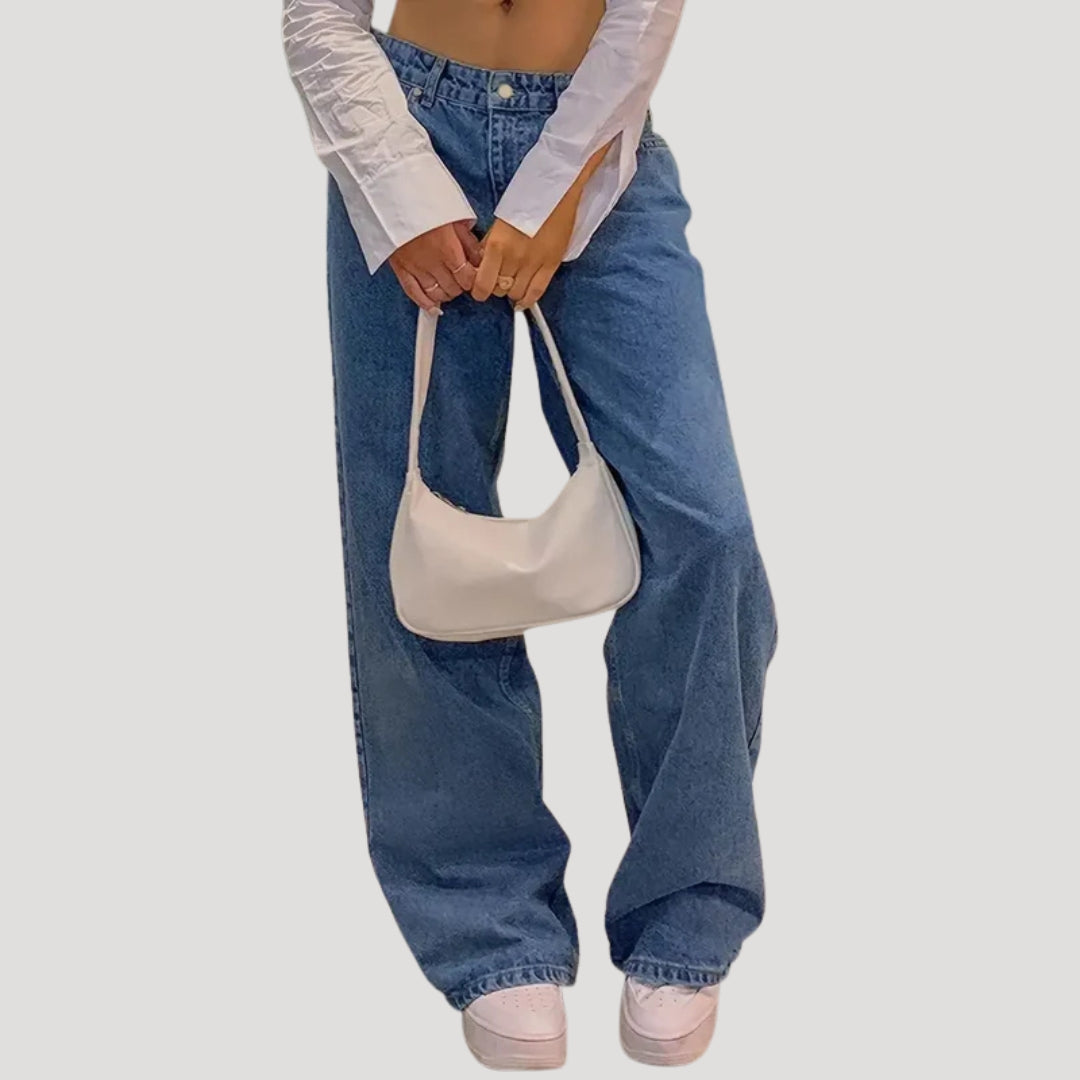 Dam lågmidjade blå vida denimjeans med breda ben och lös passform