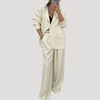 Dam kostym set med oversized kavaj och vida byxor