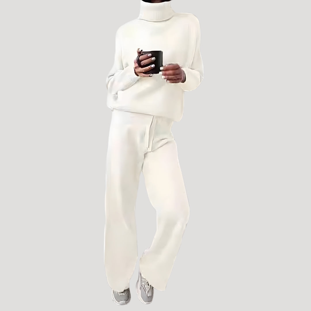 Dam stickat set polotröja och byxor