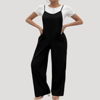 Dam svart jumpsuit lång byxdress med axelband