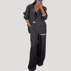 Dam kostym set med oversized kavaj och vida byxor