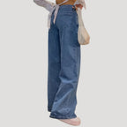 Dam lågmidjade blå vida denimjeans med breda ben och lös passform