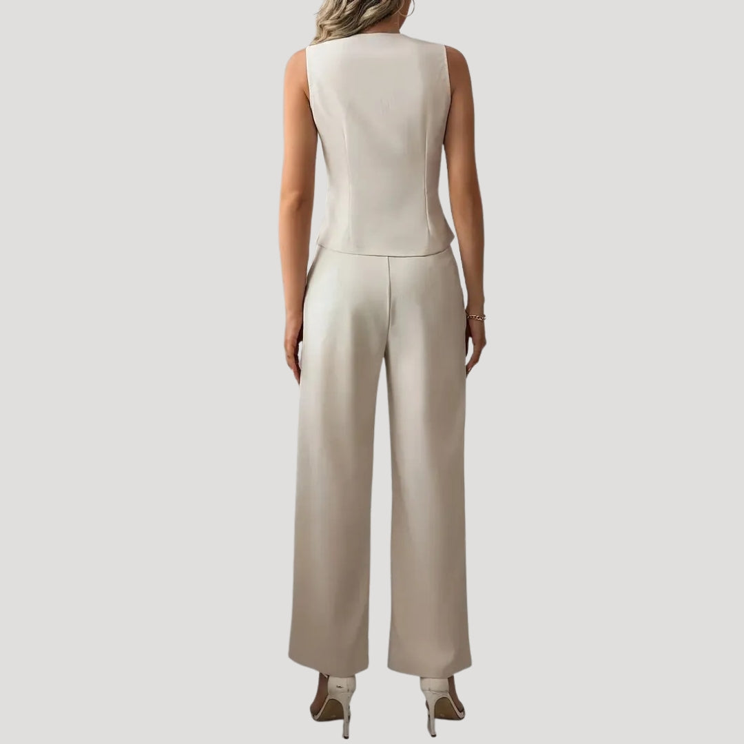 Dam kostymset tvådelat med väst och vida byxor