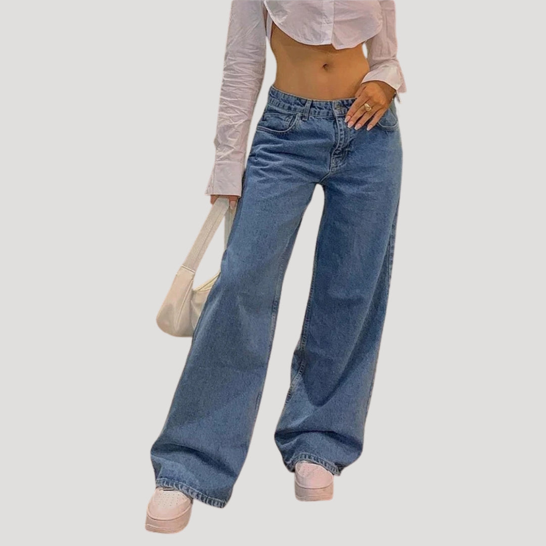 Dam lågmidjade blå vida denimjeans med breda ben och lös passform