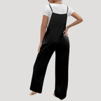 Dam svart jumpsuit lång byxdress med axelband