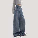 Dam högmidjade vida blå denimjeans med breda ben och ledig passform