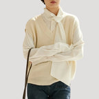 Dam stickad väst med v ringning