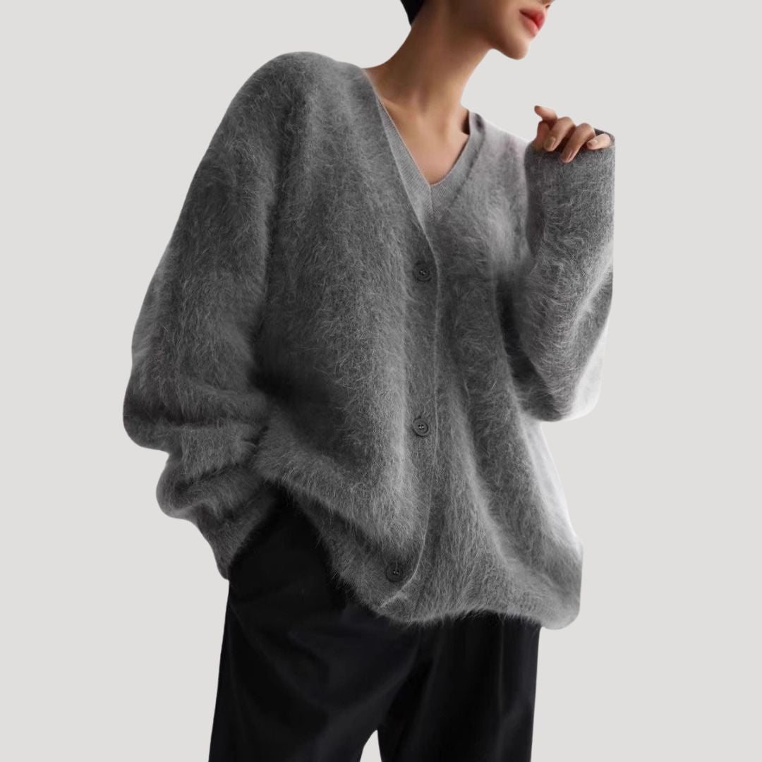 Dam stickad kofta med v ringning och knappar