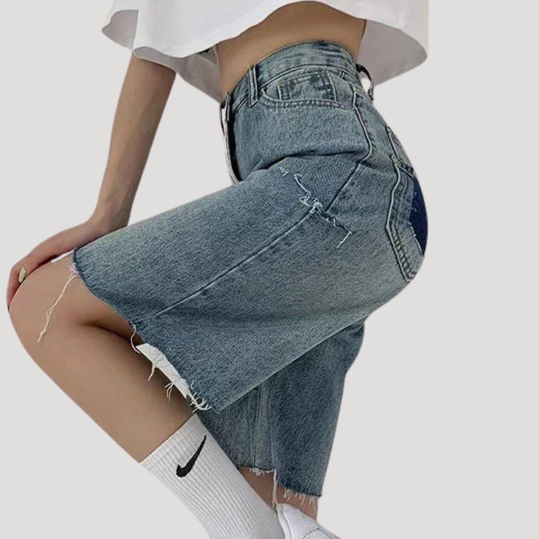 Dam jeansshorts i bermudamodell med rå kant
