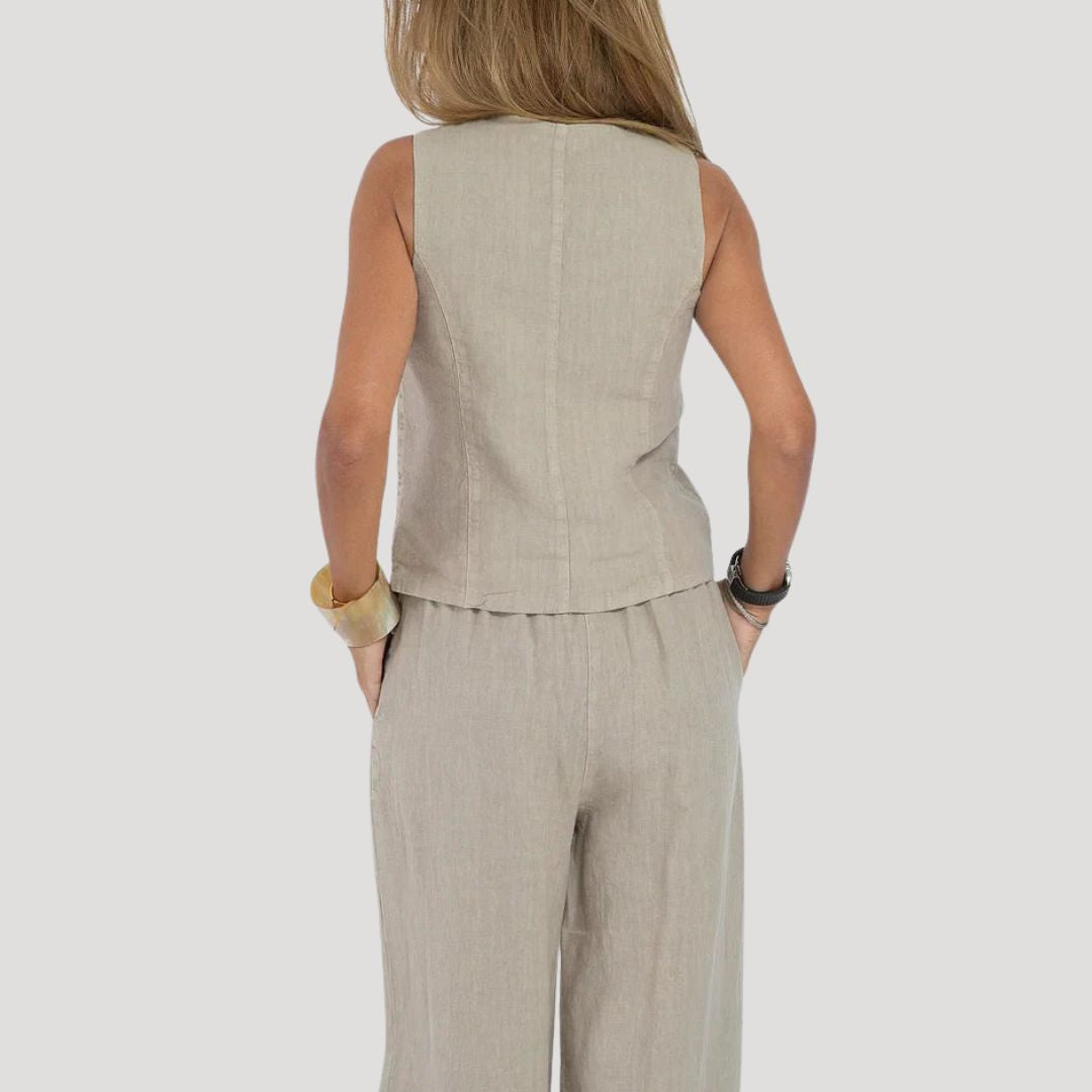 Dam tvådelat set med väst och linnebyxor