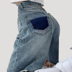 Dam jeansshorts i bermudamodell med rå kant