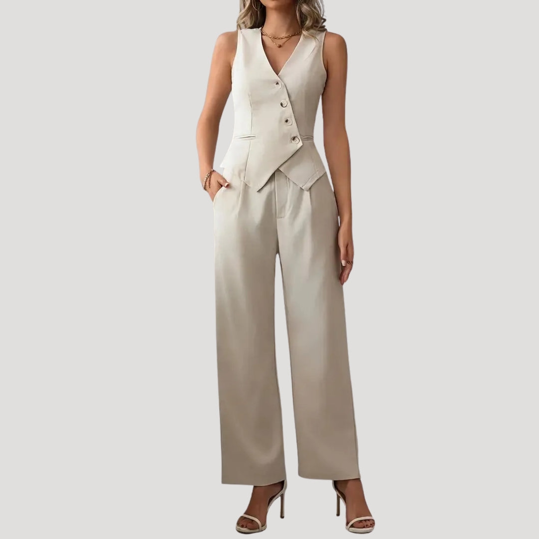 Dam kostymset tvådelat med väst och vida byxor