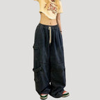 Dam mörkblå baggy cargojeans med vida ben och lös passform