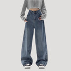 Dam högmidjade vida blå denimjeans med breda ben och ledig passform