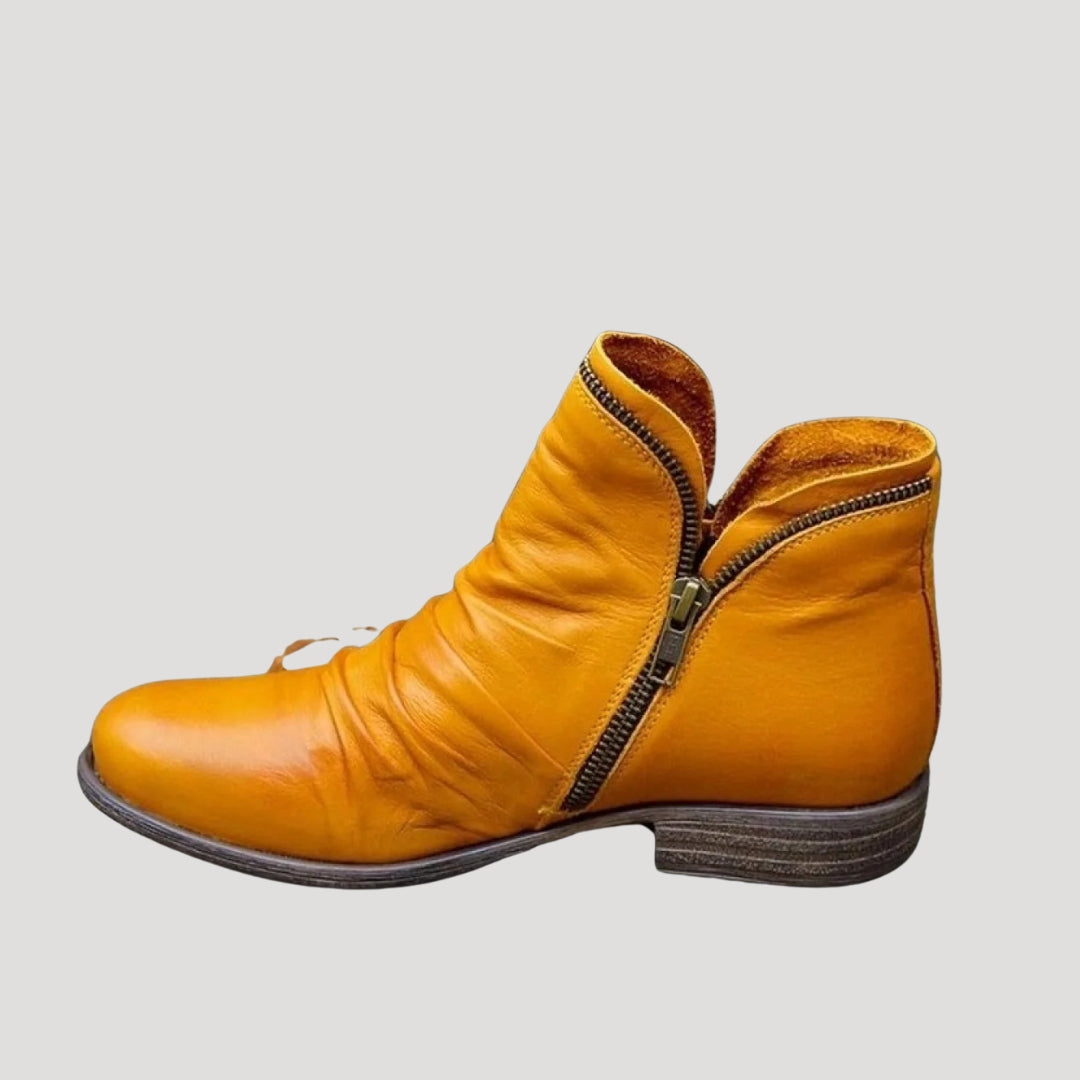 Dam ankelboots i läder med dragkedja