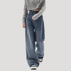 Dam högmidjade vida blå denimjeans med breda ben och ledig passform