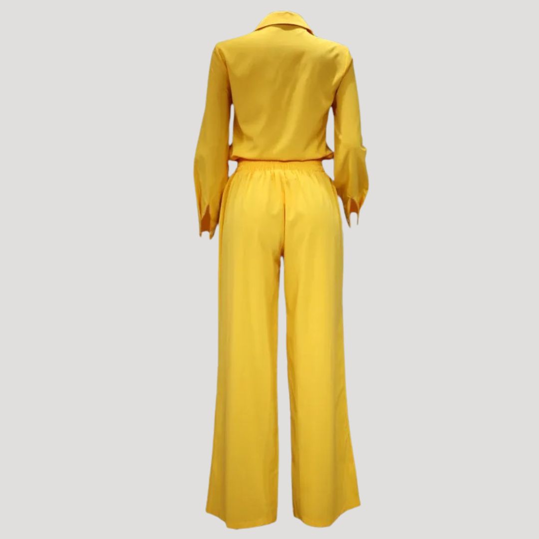 Dam långärmad jumpsuit med vida ben