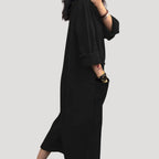Dam långärmad jumpsuit byxdress midi längd elegant passform
