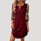 Dam långärmad klänning med broderade ärmar elegant stil