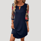 Dam långärmad klänning med broderade ärmar elegant stil