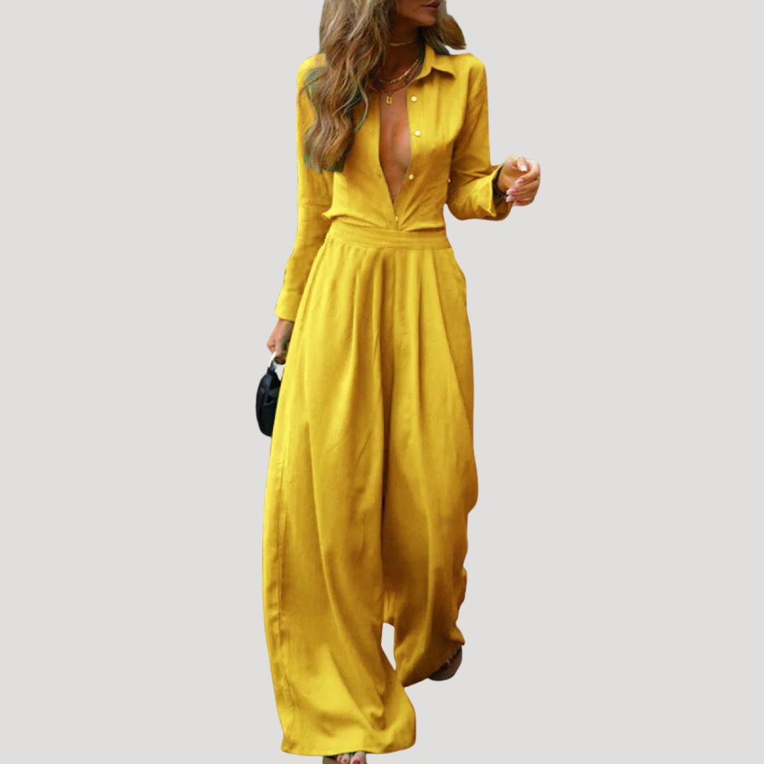 Dam långärmad jumpsuit med vida ben