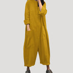 Dam långärmad jumpsuit byxdress midi längd elegant passform