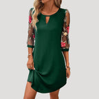 Dam långärmad klänning med broderade ärmar elegant stil