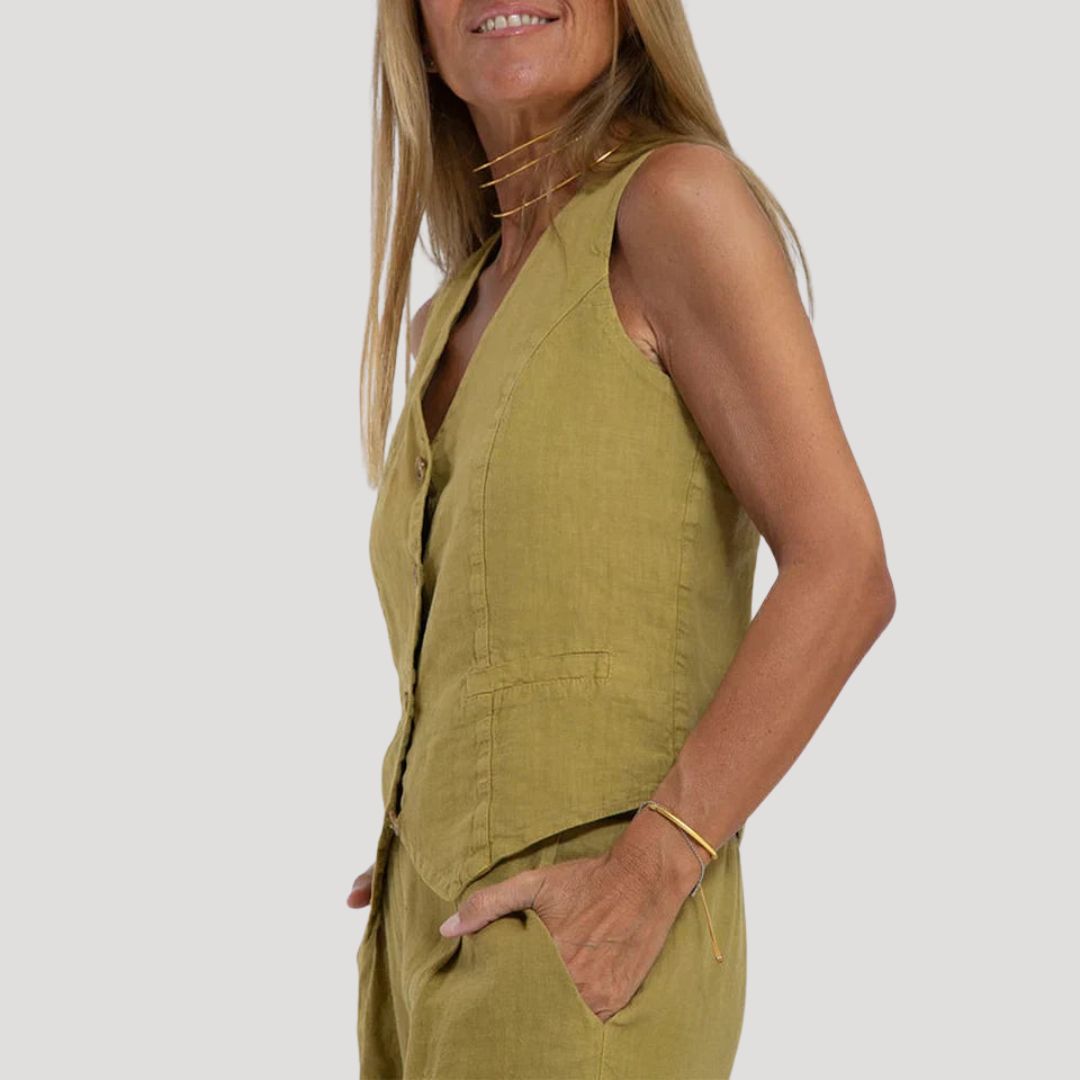 Dam tvådelat set med väst och linnebyxor