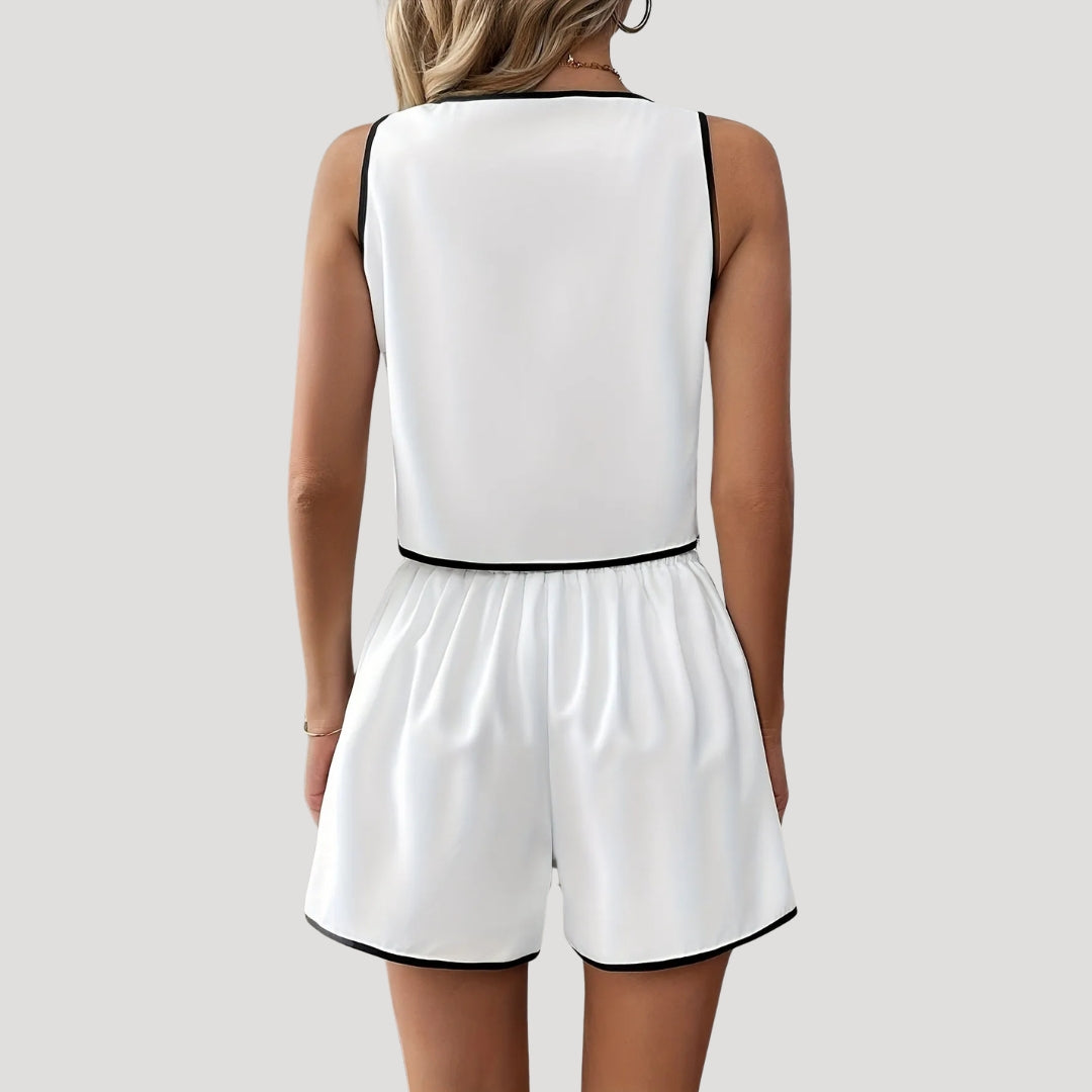 Dam vit ärmlös kort jumpsuit med fickor