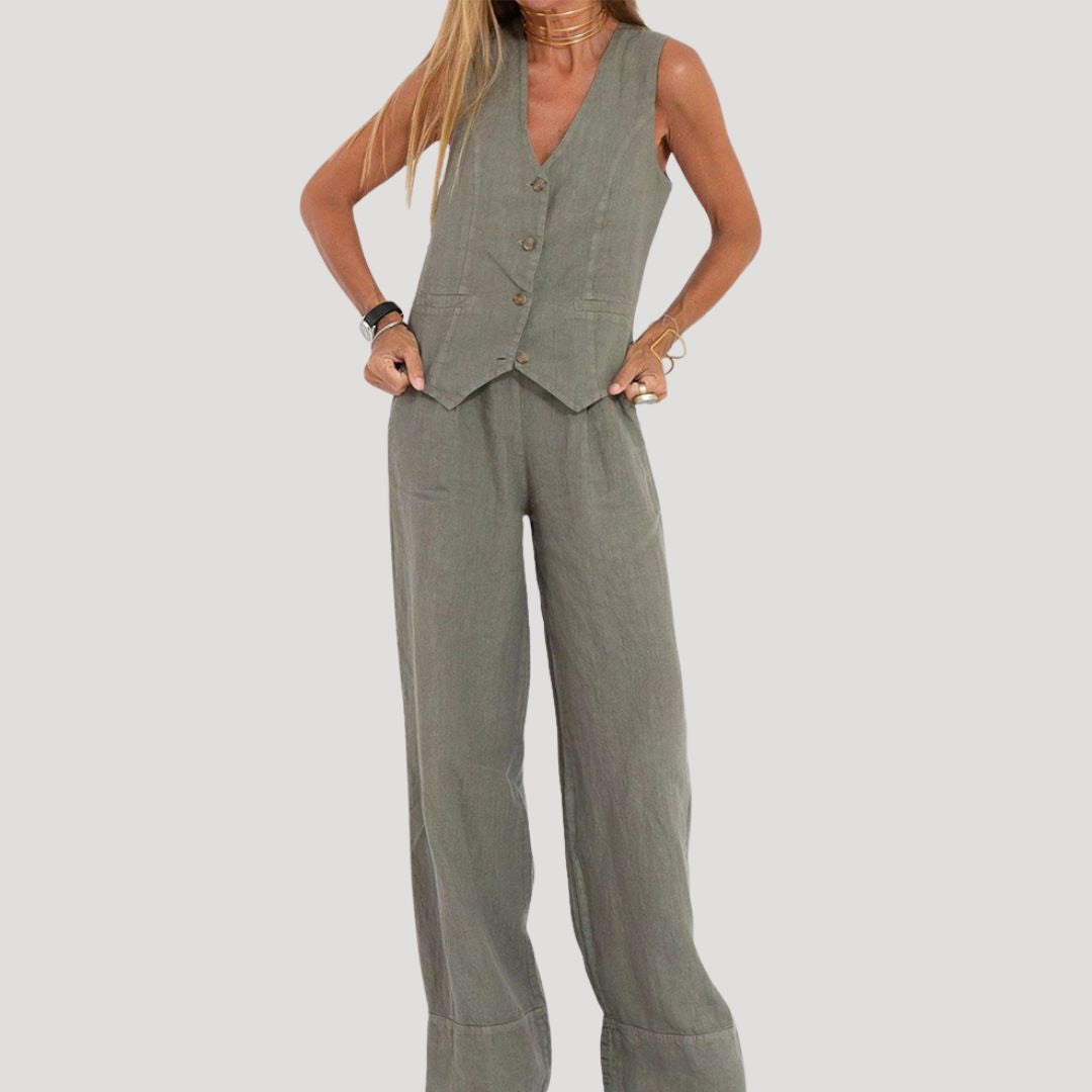 Dam tvådelat set med väst och linnebyxor