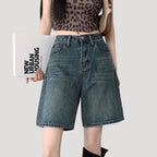 Dam jeansshorts i knälång modell med hög midja