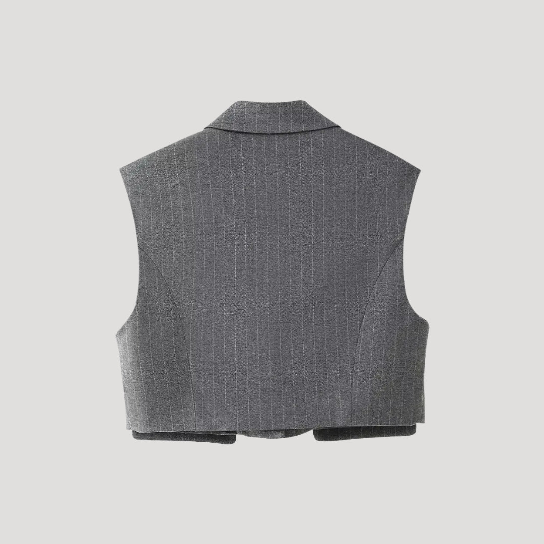 Matchande set dam – väst med vida kostymbyxor