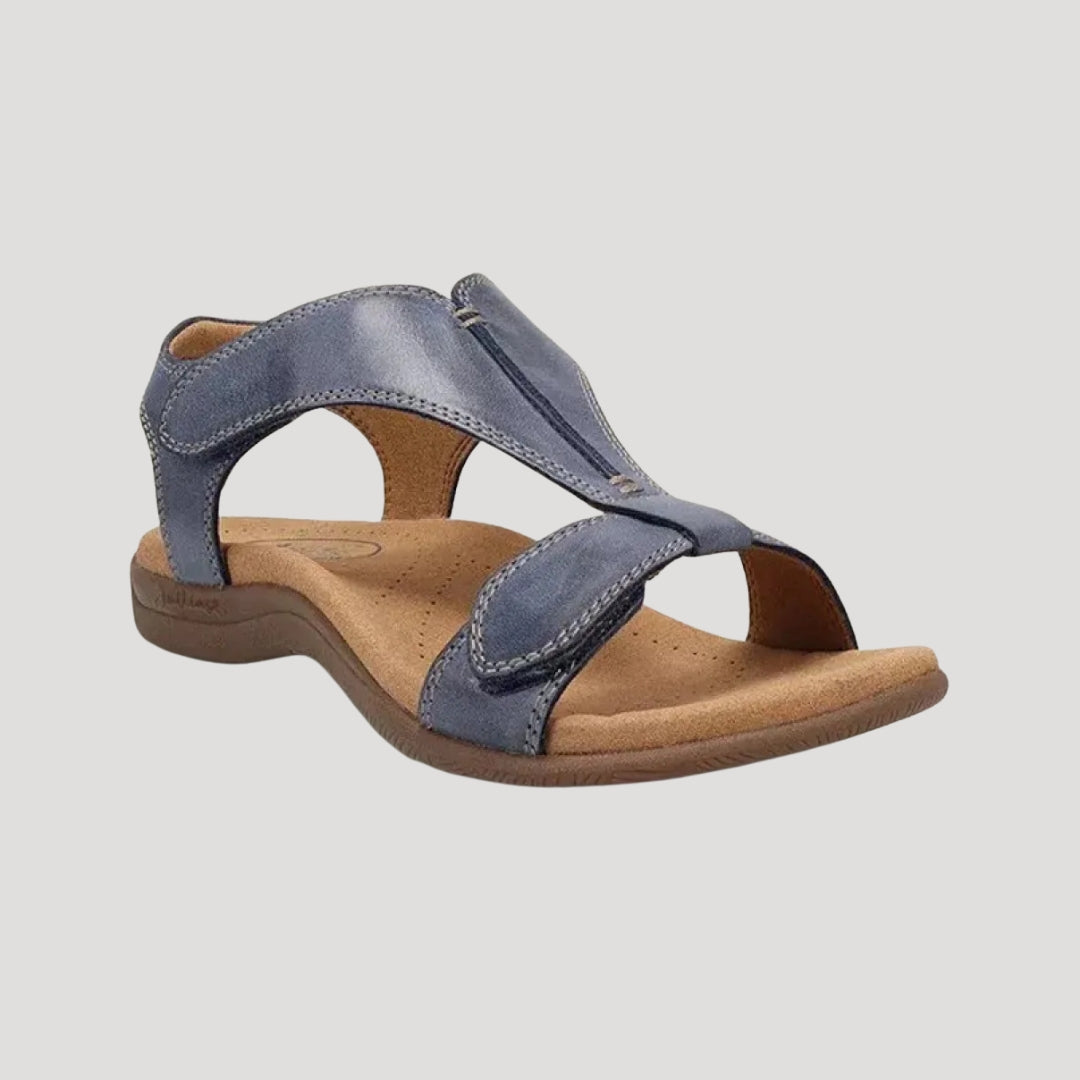 Dam tåsandaler platta i konstläder med öppen design