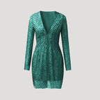 Dam v ringad paljettklänning med lång ärm