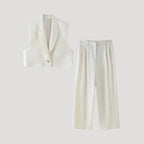 Matchande set dam – väst med vida kostymbyxor