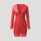 Dam v ringad paljettklänning med lång ärm