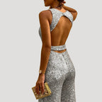 Dam byxdress glittrig fest ärmlös öppen rygg elegant stil